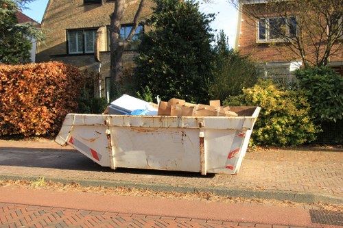 Professional crew handling bulk waste removal in a Pimlico street
