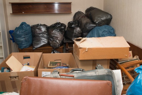 Clearing a flat interior in Pimlico with careful removal of belongings